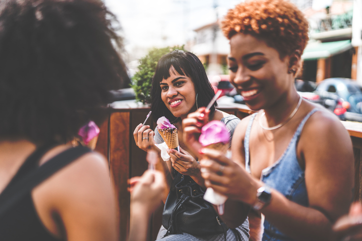 Girl Friends Eating Ice Cream