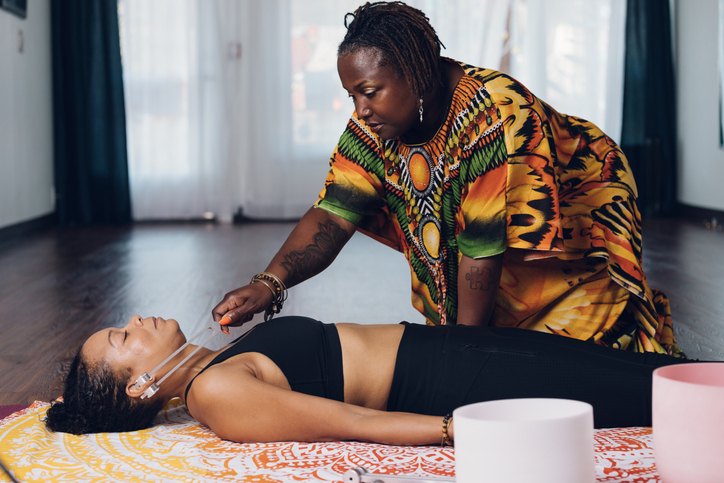 holistic healer using tuning forks