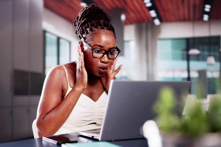 Tired Woman With Computer And Ransomware Malware