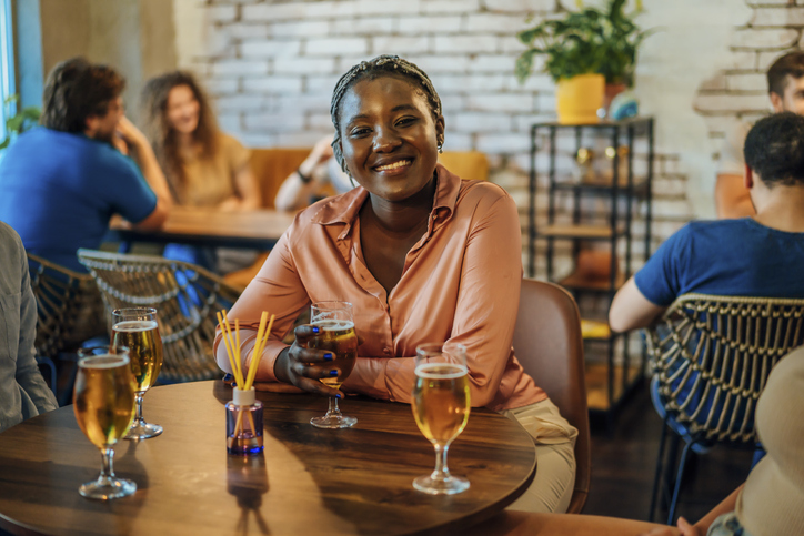 Portrait of a young woman in the pub