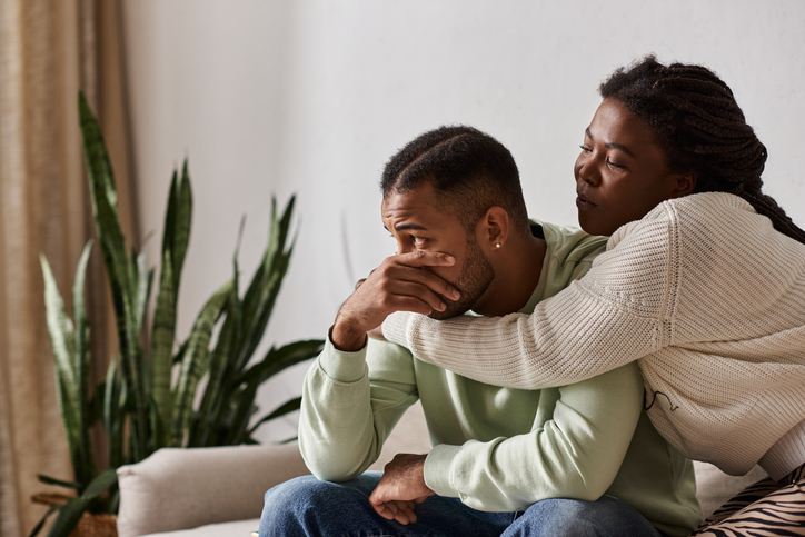 Cozy moments shared by a loving couple in winter sweaters at home together