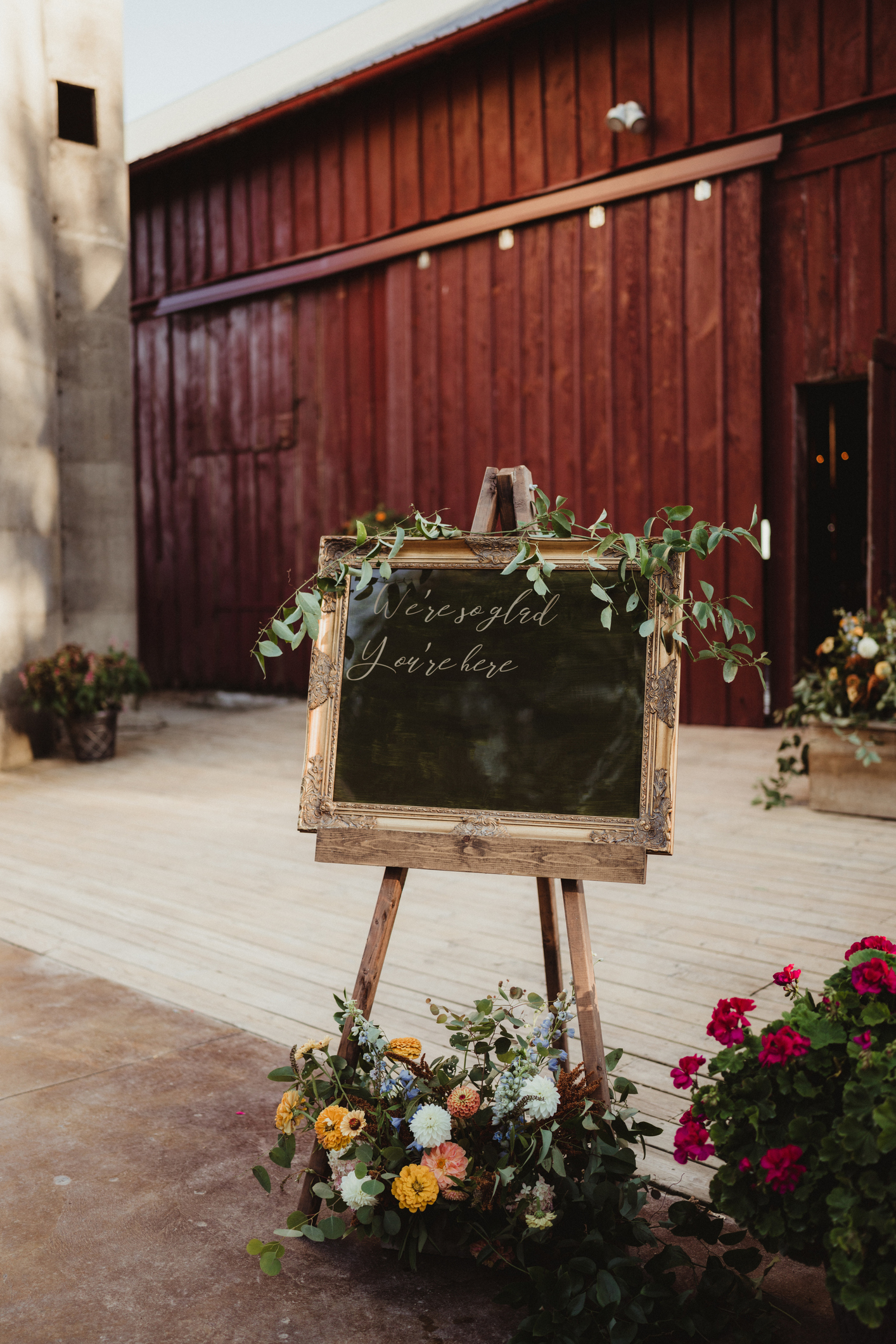 Blank empty chalkboard gold framed sign outside of wedding reception