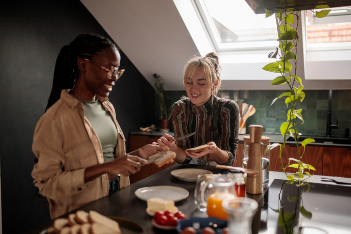 Friends Making Breakfast at Home