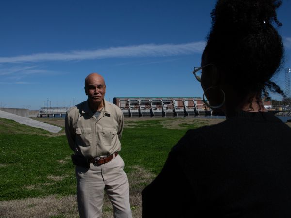 Eric A. Wright speaks with Director Traci A. Curry