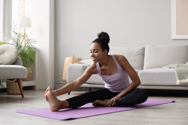 Young woman doing fitness exercises.