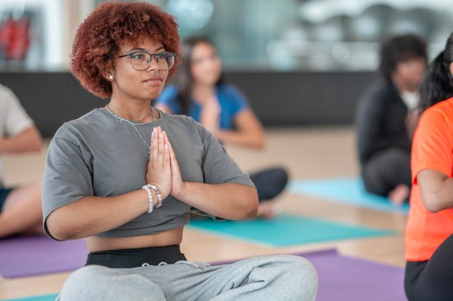 Young Woman Practicing Yoga in Calm Indoor Studio Environment