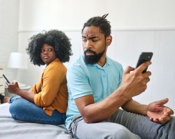 phone woman couple conflict problem man girlfriend mobile boyfriend husband young wife smartphone angry unhappy quarrel mobile phone girl cheating communication