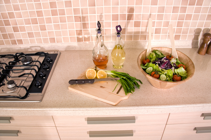 bowl of fresh salad on domestic kitchen counter