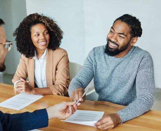 contract woman man signing couple investment house agent real estate business agreement client office home property meeting mortgage document insurance
