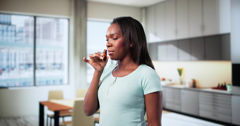 Professional Aromatherapist Providing Herbal Treatment Using Essential Oils