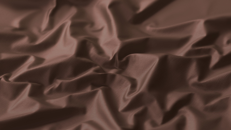 Blank brown folded crumpled fabric material mockup, depth of field