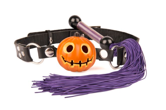 Pumpkin head ball gag and whip