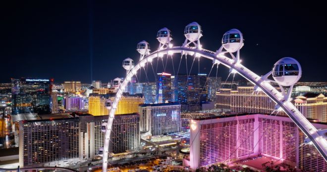 Drone Shot of Las Vegas, Nevada from over Famous Ferris Wheel at Night