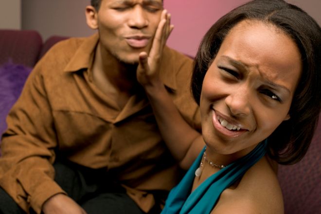 Woman pushing man away