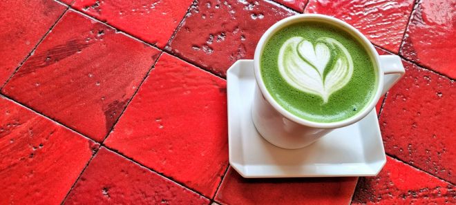 Matcha love on red tile table