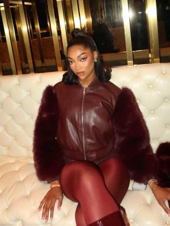 Angel Reese Wearing Maroon Outfit