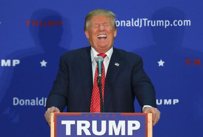 (011816 Concord, NH) Republican candidate for President Donald Trump laughs as someone in the crowd makes a joke about Hillary Clinton as he speaks at an event in Concord, NH on Monday, January 18, 2016. Staff Photo by Nancy Lane