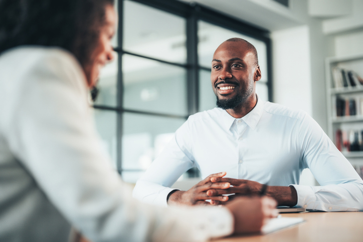 Business meeting in the office, accountant and financial advisor with feedback for finance update, report review and documents