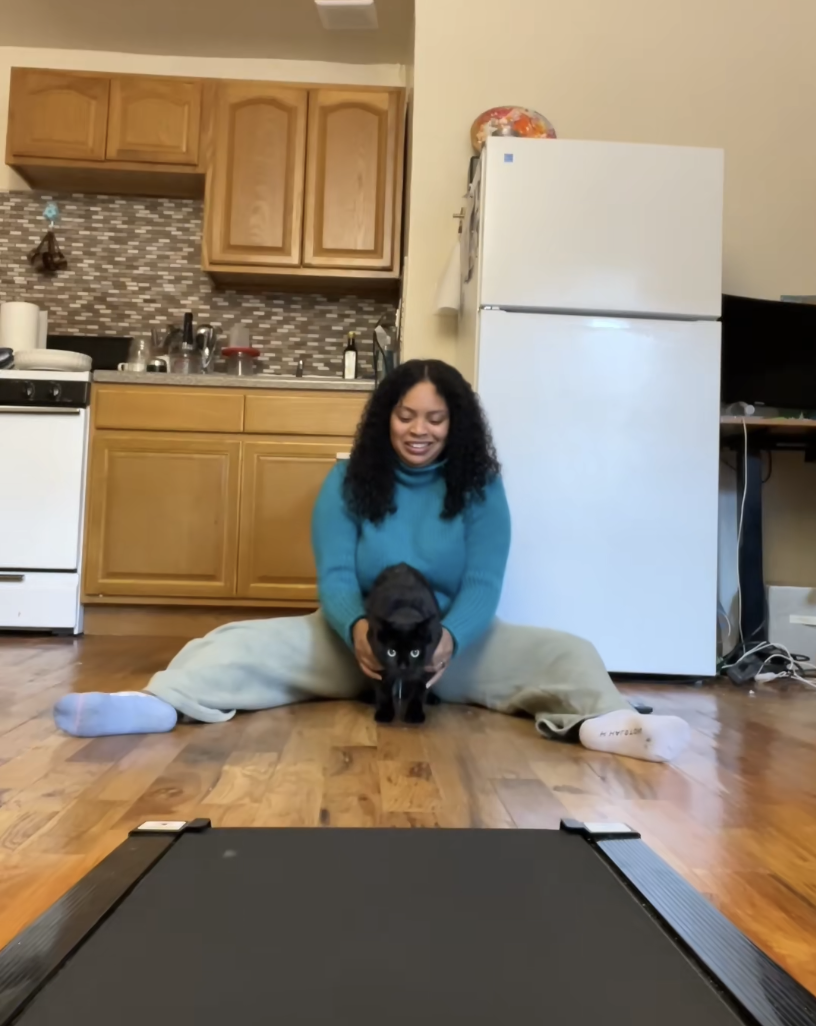 Mariah Sola and Archie the cat