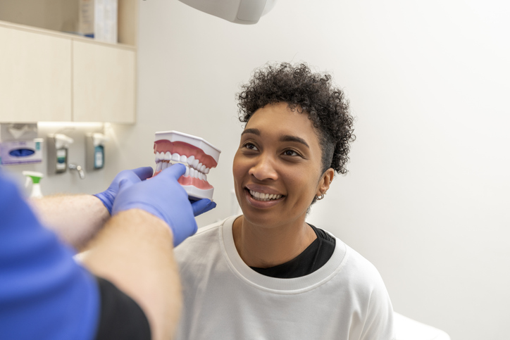Dentist check-up for a black woman in a dental surgery