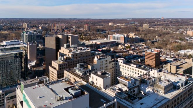 Drone aerial view of downtown Wilmington Delaware rooftops and skyline