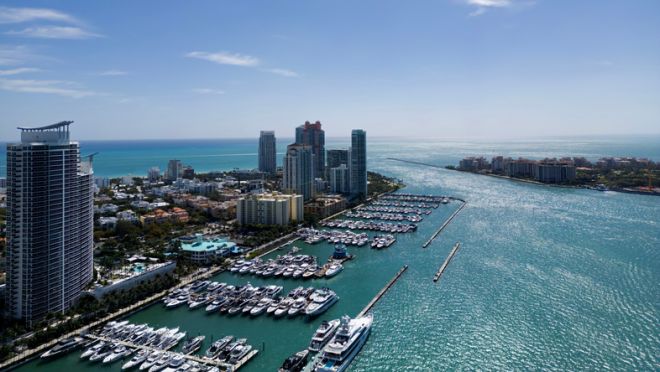 Miami city aerial view. Miami coastal cityscape. Miami Beach downtown. Miami ocean shore.