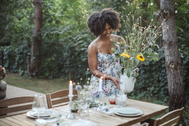 Setting table for dinner outdoors