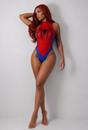 A woman wearing a red and blue Spider-Man-inspired bodysuit poses against a white background, with her arms raised and a confident expression.