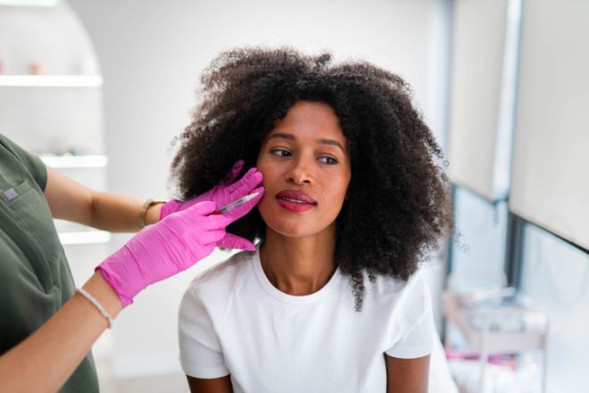 Dermatologist with her favourite patient