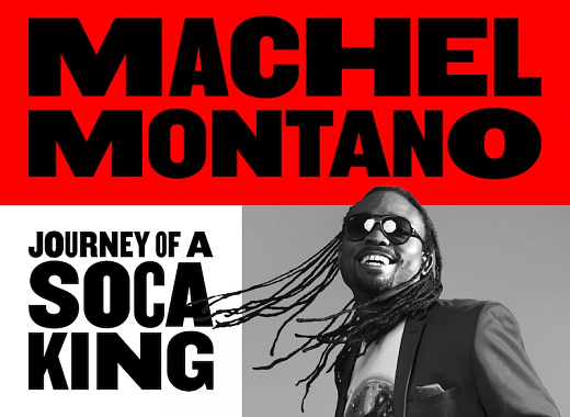 Machel Montano, a Soca musician, smiling and wearing sunglasses with dreadlocks.