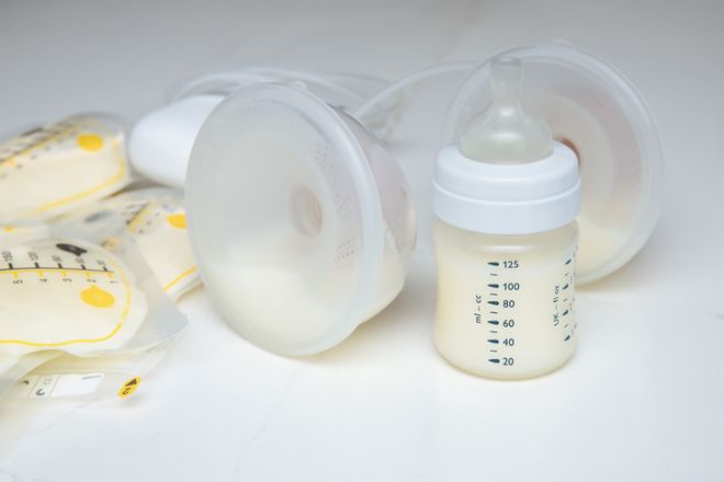 Breast pump, baby bottle, and breast milk storage bags.
