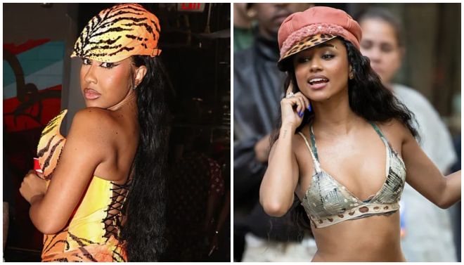 Two women wearing colorful, patterned outfits and headpieces posing for the camera.